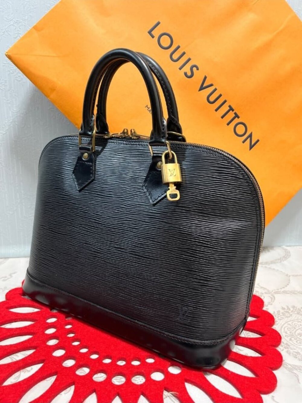 Louis Vuitton Alma Handbag